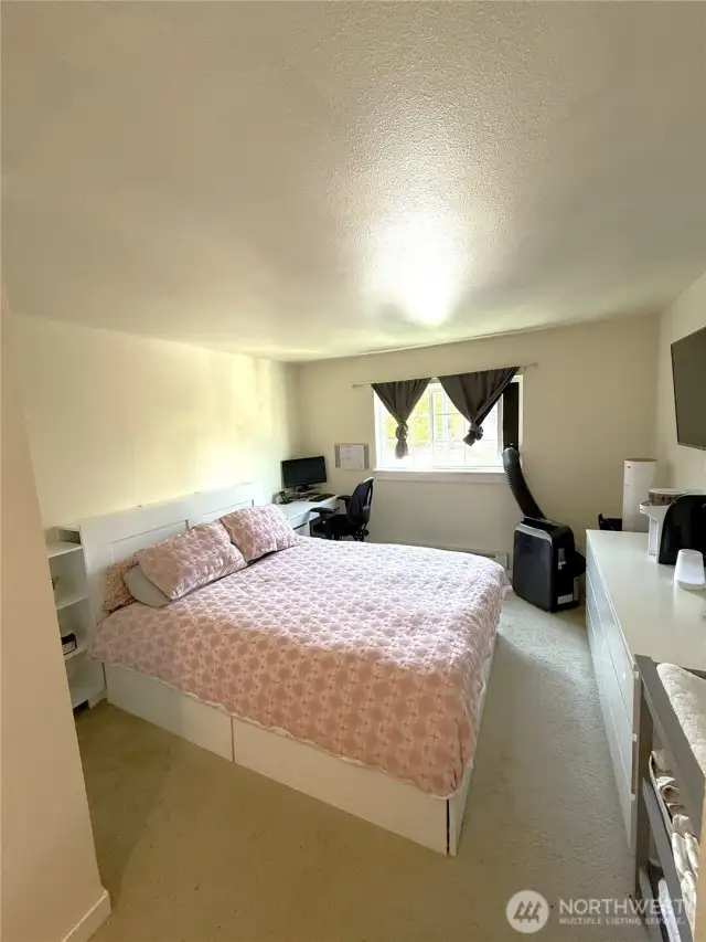 Primary bedroom view as you walk in