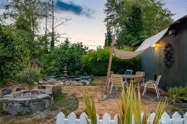 Exterior pond, sitting area & firepit