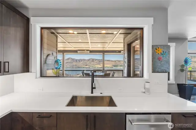 Kitchen features massive picture window.