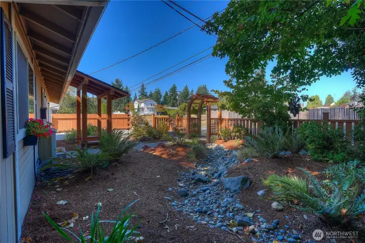 Professionally landscaped front and back yard.