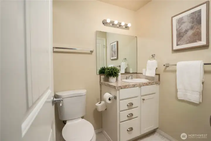 First bathroom which can be entered from the hall, or from the main bedroom.