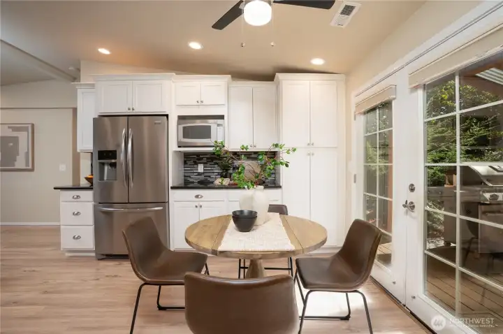 French doors lead you out onto a large, covered deck.