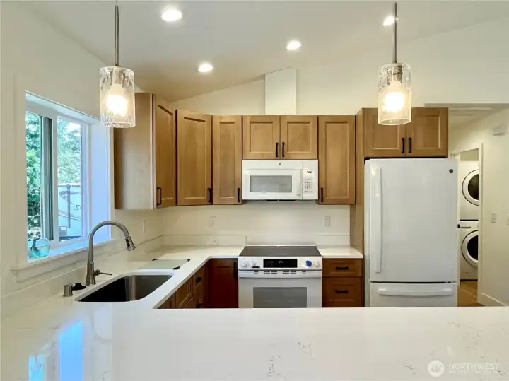 Spacious and Designed for Convenance, Entertaining and Additional Eating Spaces at the Kitchen Bar