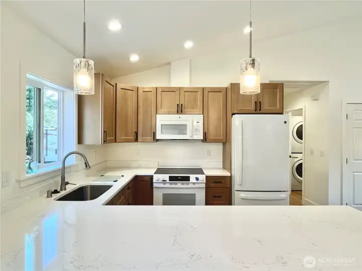 Spacious and Designed for Easy Beach Life. Additional Eating Spaces at the Kitchen Bar. Spacious and Designed for Easy Beach Life. Additional Eating Spaces at the Kitchen Bar.