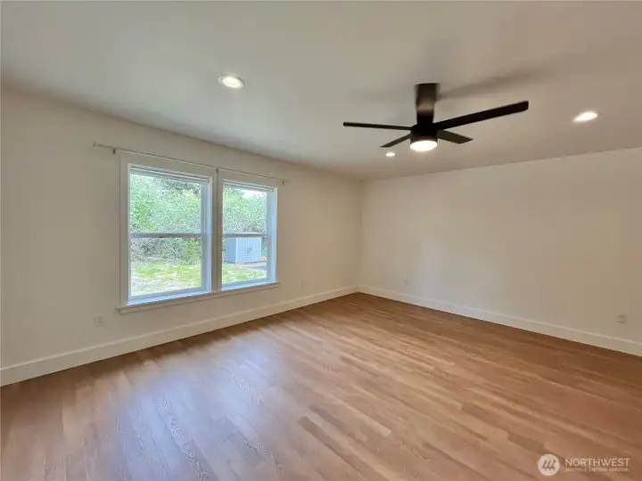 Large Primary Bedroom with lots of room for favorite bedroom furniture. Bedroom has room for a sitting area along with a wall of storage Large Primary Bedroom with lots of room for favorite bedroom furniture. Bedroom has room for a sitting area along with a wall of storage