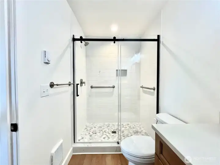 Primary Bathroom has Elegant Tile Shower. Primary Bathroom has Elegant Tile Shower.