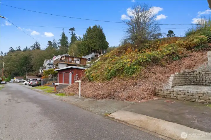Rare Camano lot with utilities nearby and quick access to sandy shoreline.