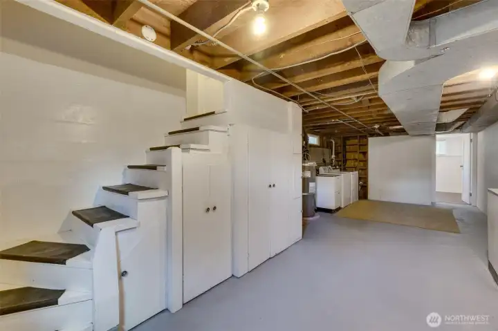 Stairs off kitchen leading to basement