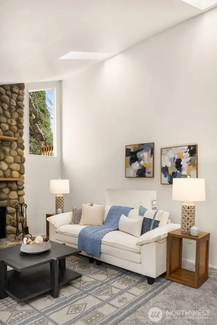 Living Room w/Vaulted ceilings and Skylights