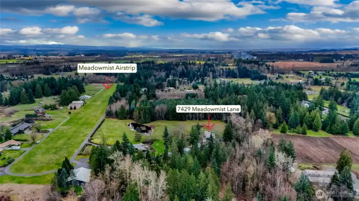 Home sits parallel to airstrip.