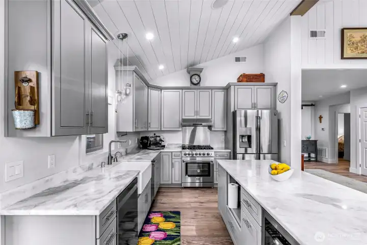 Full kitchen remodel completed in 2025 along with home renovation - soft close cabinets, all new appliances, range is gas & electric, trash compactor AND beverage fridge for additional storage space.