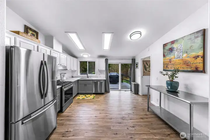 Recently updated kitchen with newer stainless steel appliances, cabinets and countertops.