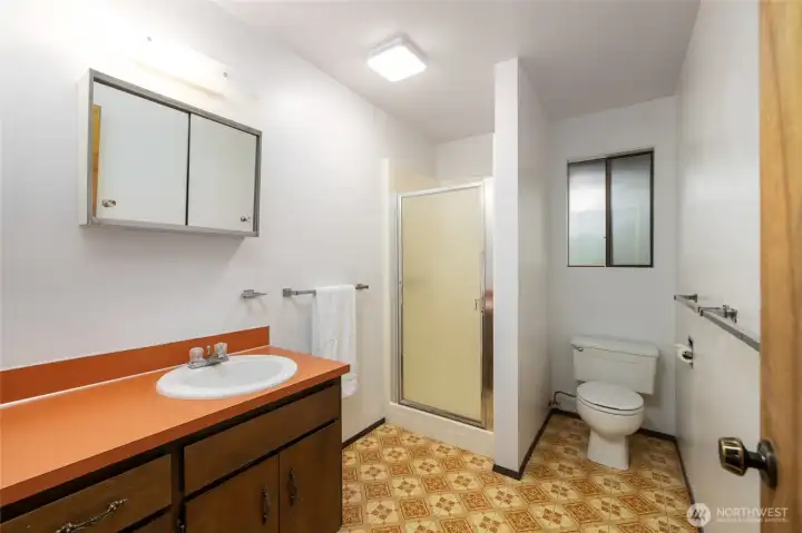 Lower level, 3/4 bathroom. Vintage charm abounds.