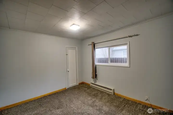 Bedroom #2. New flooring and paint.