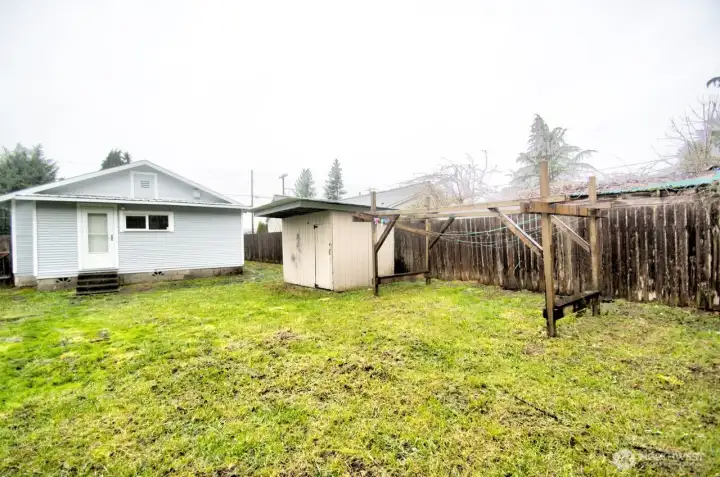 Good-sized back yard; fully-fenced with shed and garden space.