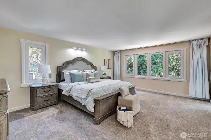 Private primary suite is located on the upper floor and features Smart window curtains