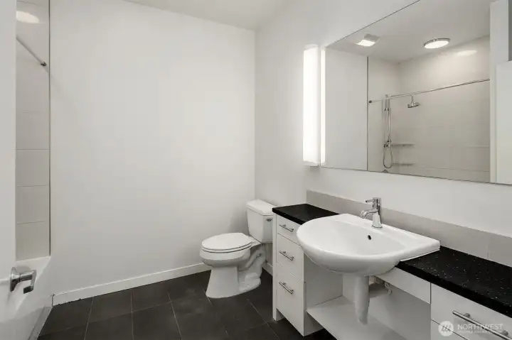 Spacious bathroom with full bathtub