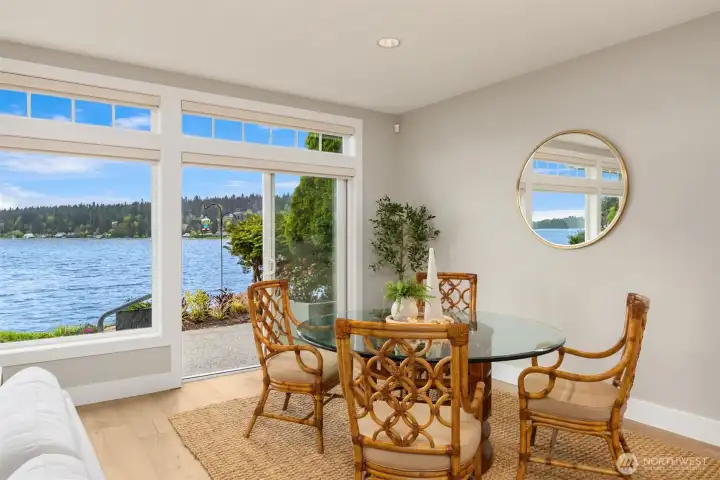 Dining area with door leading out to patio that's perfect for entertaining or a glass of wine at the end of the day!
