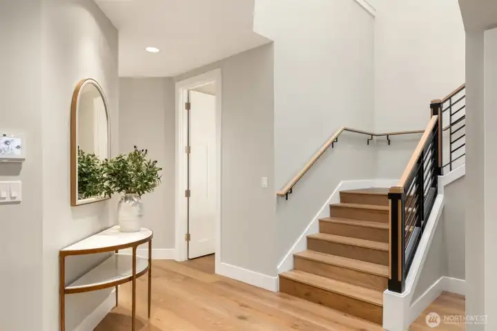 Rory's fabricated custom hand-rail. All new hardwoods throughout!