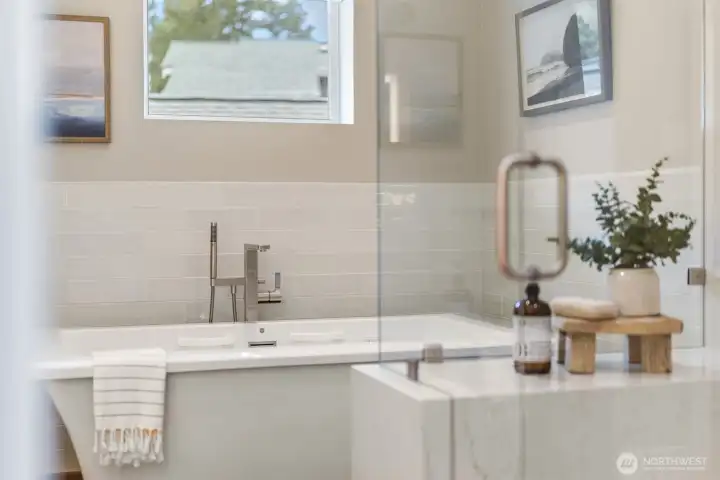 All bath fixtures are from Ferguson and stone work from Grandy Marble and Tile...