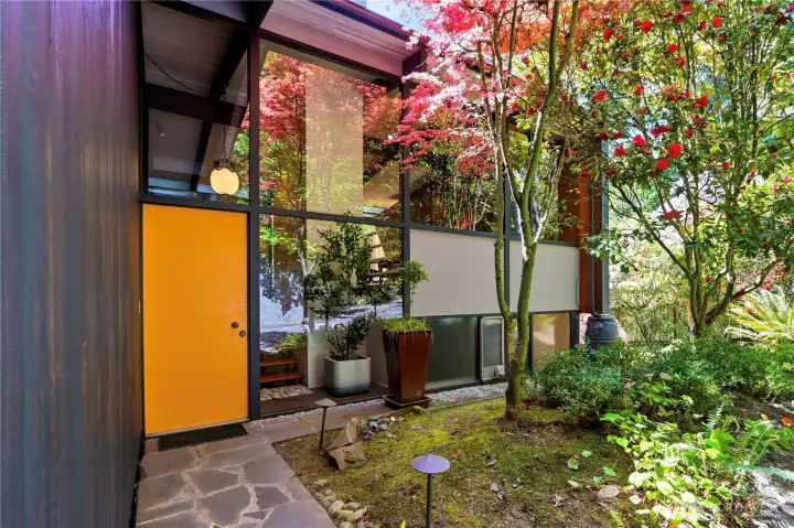 A rare example of Mid-Century Modern design in the coveted Hidden Lake enclave of Innis Arden.