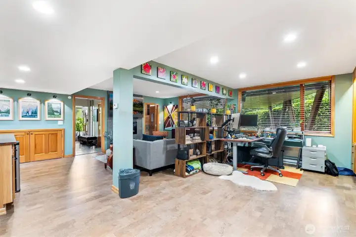 Open-concept living area with flexible space for lounging, entertaining, or creative use. Open-concept living area with flexible space for lounging, entertaining, or creative use.