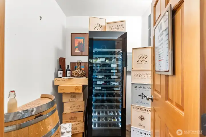 Dedicated wine storage room perfect for collectors and entertaining enthusiasts. Dedicated wine storage room perfect for collectors and entertaining enthusiasts.