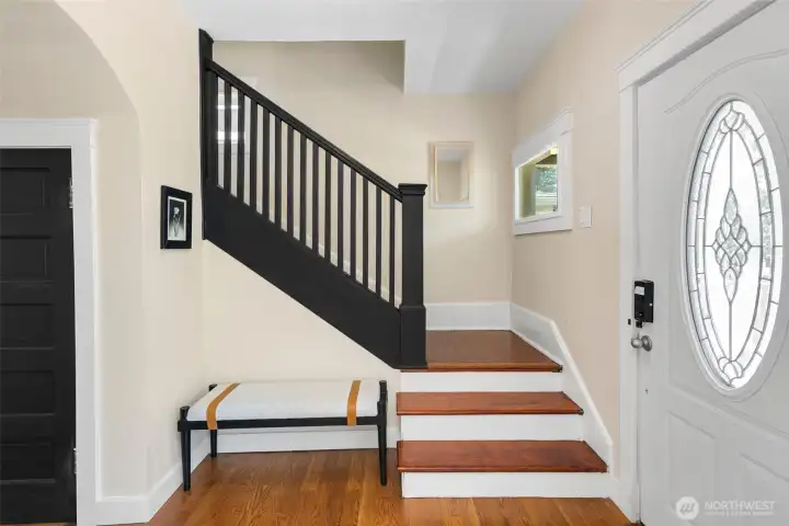 Beautiful entry with hardwood floors on main level and fir floors upper.