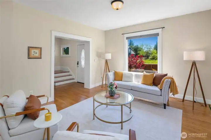Bright living room with hardwood floors.