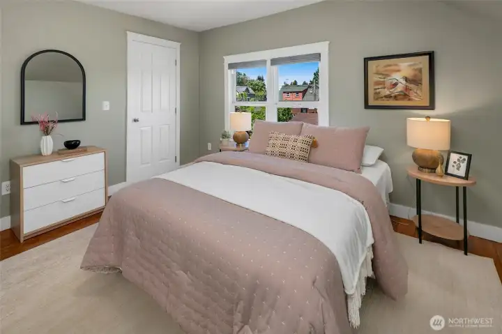 One of 3 upper level bedrooms, all with closets.