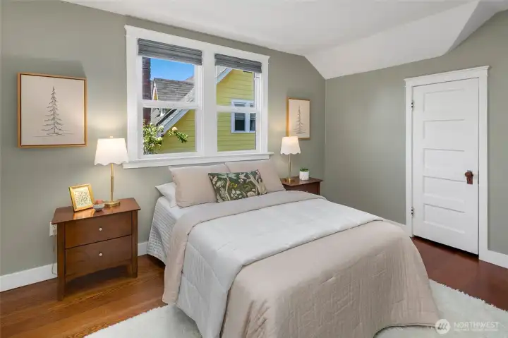 One of 3 upper level bedrooms, all with closets.