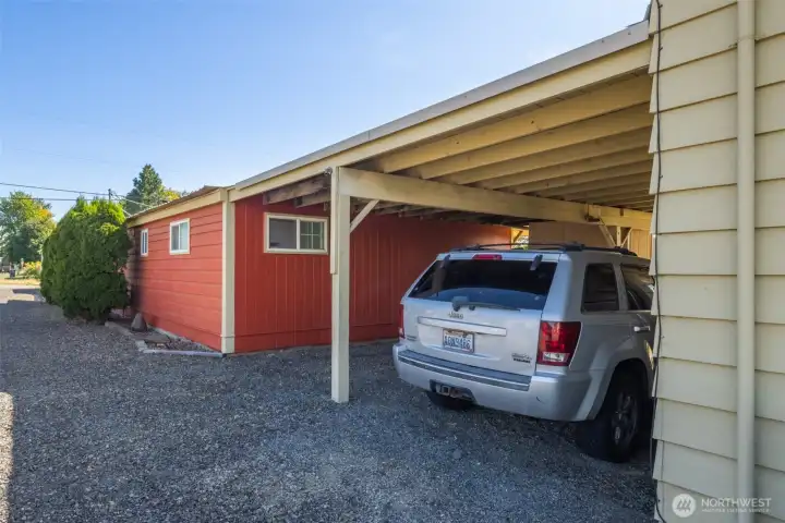 Carport for 2 spots of additional covered, off-street parking.