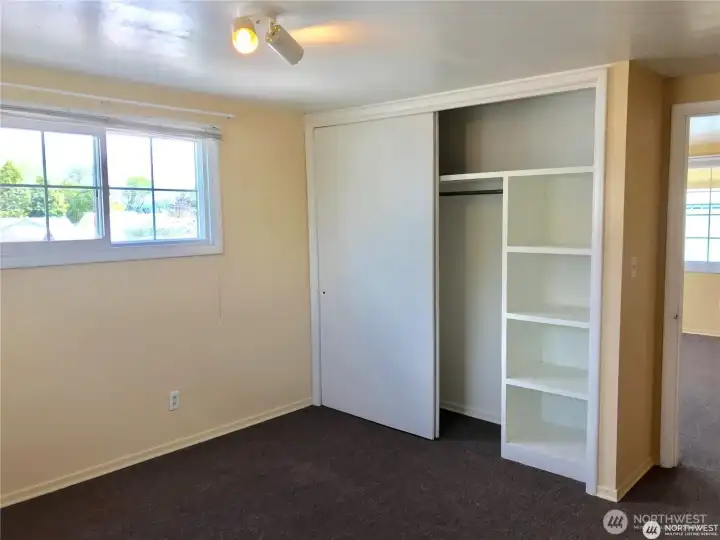 Built in closets with lots of shelving, updated windows, & fresh paint.