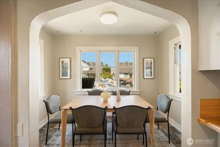 Dining nook with natural light on 3 sides and sunset skies. Dining nook with natural light on 3 sides and sunset skies.