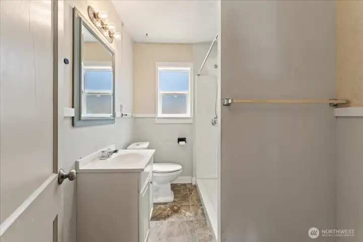 Main floor bathroom. Tub was converted to shower and could be converted back as desired. Main floor bathroom. Tub was converted to shower and could be converted back as desired.