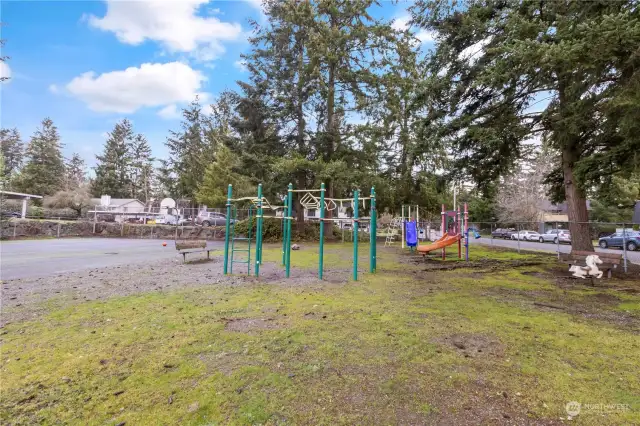 This location has a playset onsite with a basketball court for adults and children to utilize. (Very near building site.)