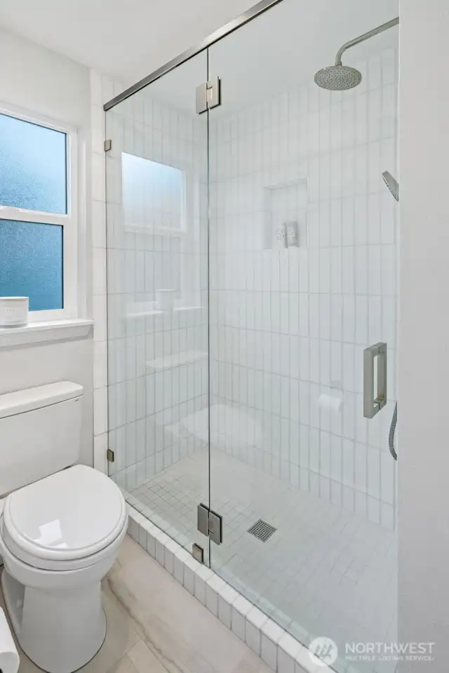 Custom Hand Blown Glass Tile in Shower with Rain Shower Head