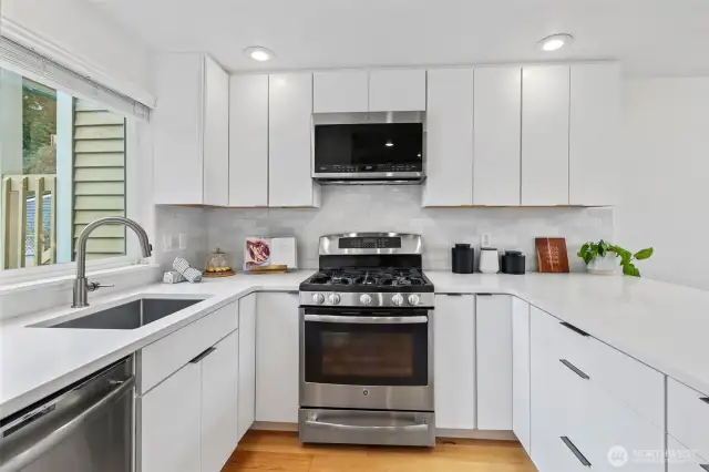Kitchen remodel in 2021 with quartz counters and custom soft close cabinets