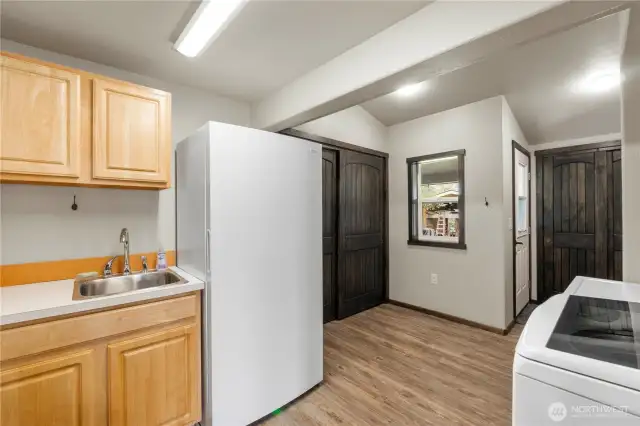 Laundry room.  (freezer stays w/seller)