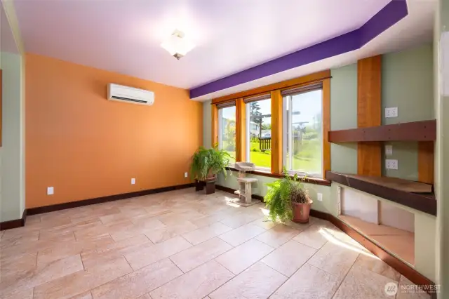 Living room has south facing windows for lots of light.