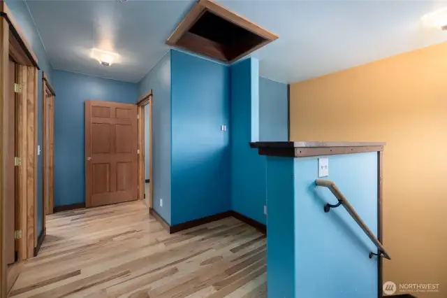 Upstairs landing could be a great craft area or office space.