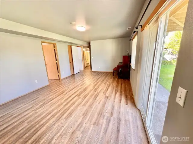 Lower level Family Room w/ Sliding doors leading to Backyard w/Patio