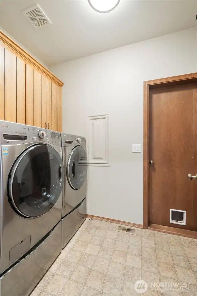 Centrally located laundry/mudroom located just off the garage.