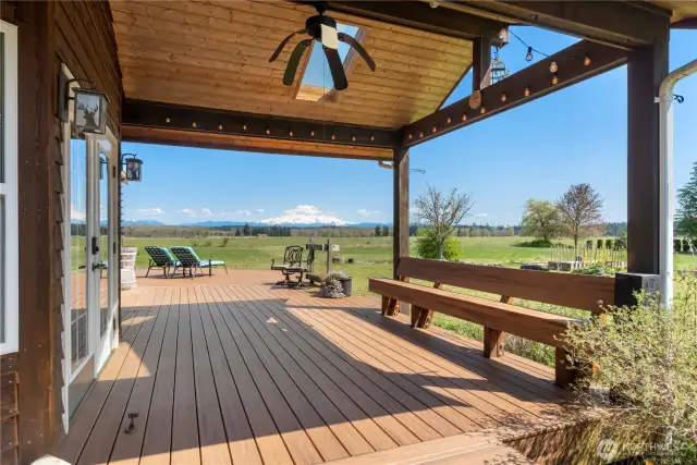 Outside the kitchen area find this perfect covered space to relax and stay out of the elements year round.