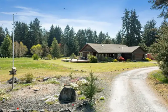 Tucked away at the end of a quiet dead-end road find your private sanctuary nestled on just shy of 3 acres.