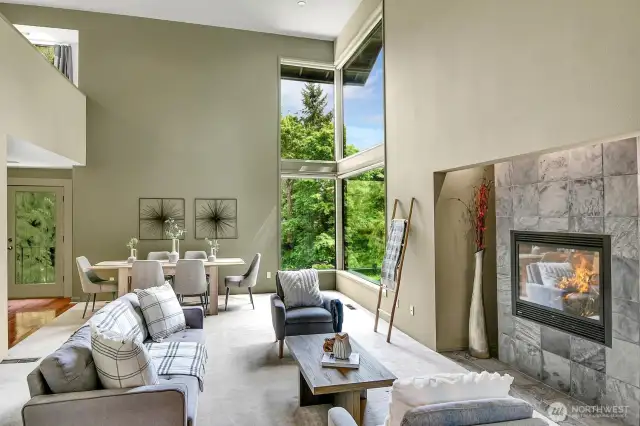 A gas fireplace with slate surround warms the formal living & dining areas of the home.