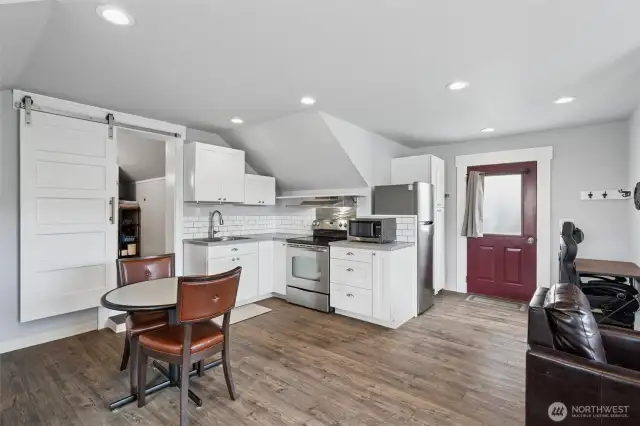 With a 2nd kitchen, bathroom, and ample off-street parking, this private retreat is perfect for extended family, guests, or an office.