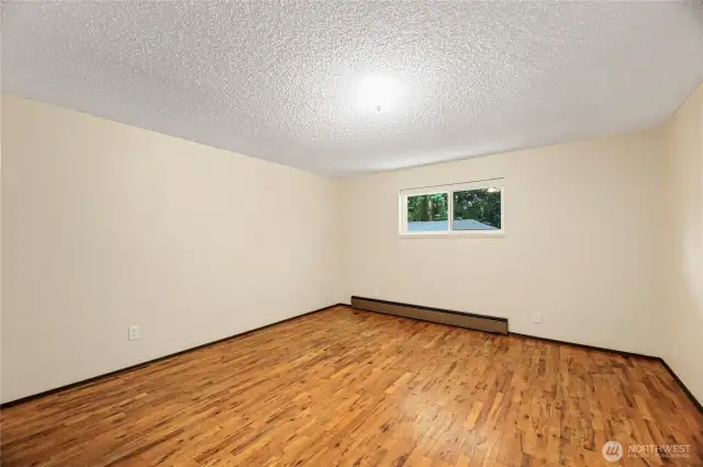 Primary Bedroom with orgininal hardwood floors