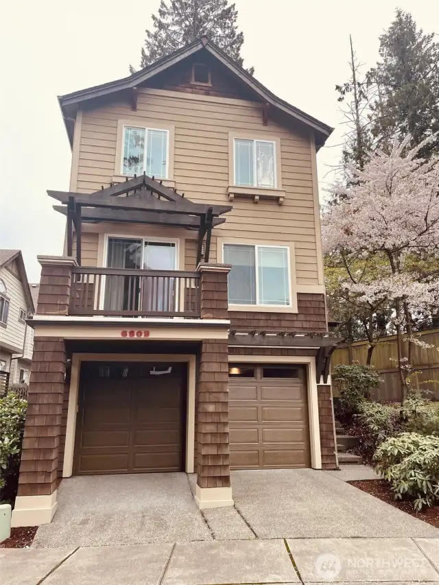 Front Elevation, 3 floors, private corner lot, with 2 car garage