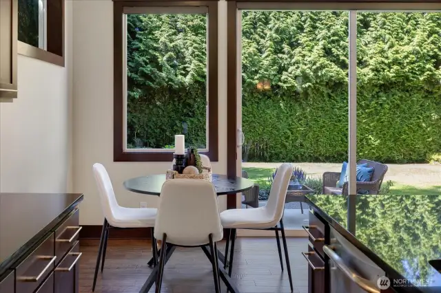 Kitchen table area with great view of back yard.